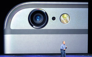 Phil Schiller...Phil Schiller, Apple's senior vice president of worldwide product marketing, discusses the camera features on the new iPhone 6 and iPhone 6 plus on Tuesday, Sept. 9, 2014, in Cupertino, Calif. (AP Photo/Marcio Jose Sanchez)