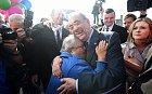 Scotland's First Minister Alex Salmond is welcomed by a pro independence voter during a Yes rally in east Edinburgh, Scotland, 10 September 2014. The three main British political parties put on a rare show of unity to back a plan to transfer new powers to Scotland should it reject independence in the 18 September 2014 vote
