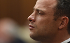 South African paralympian athlete Oscar Pistorius weeps in the dock 