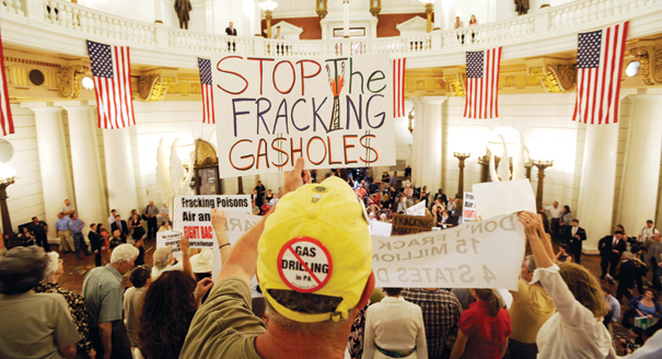 An environmental clean water protester participates in a rally in the state capitol against gas drilling in the Marcellus Shale natural gas formation Tuesday, June 7, 2011 in Harrisburg, Pa. | AP Photo