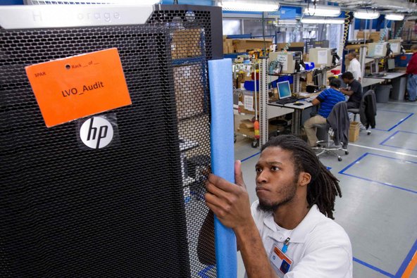 HP servers being assembled for use with cloud computing. The company is offering its own cloud system, which it can operate on behalf of private companies.