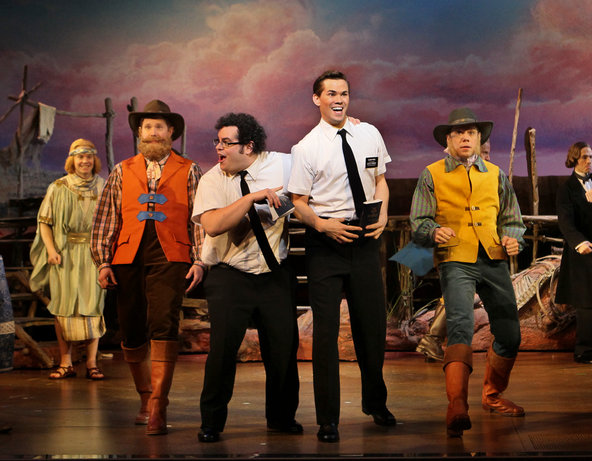 Josh Gad, center left, and Andrew Rannells in the musical "The Book of Mormon."