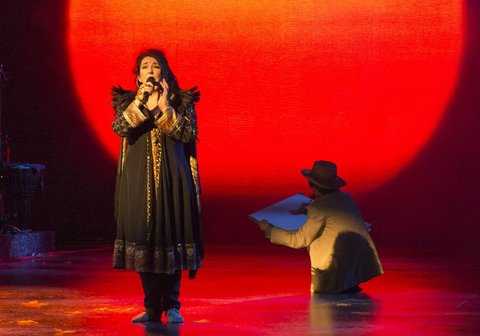 <strong>Kate Bush </strong>performing in London, with her son, Bertie McIntosh.