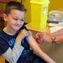 Luke Tanner, 7, gets vaccinated for measles at a clinic near Swansea, Wales, in April. Wales is at the center of a measles outbreak that has been linked to one death.