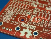 Open_Source_Hardware_(OSHW)_Logo_on_blank_PCB