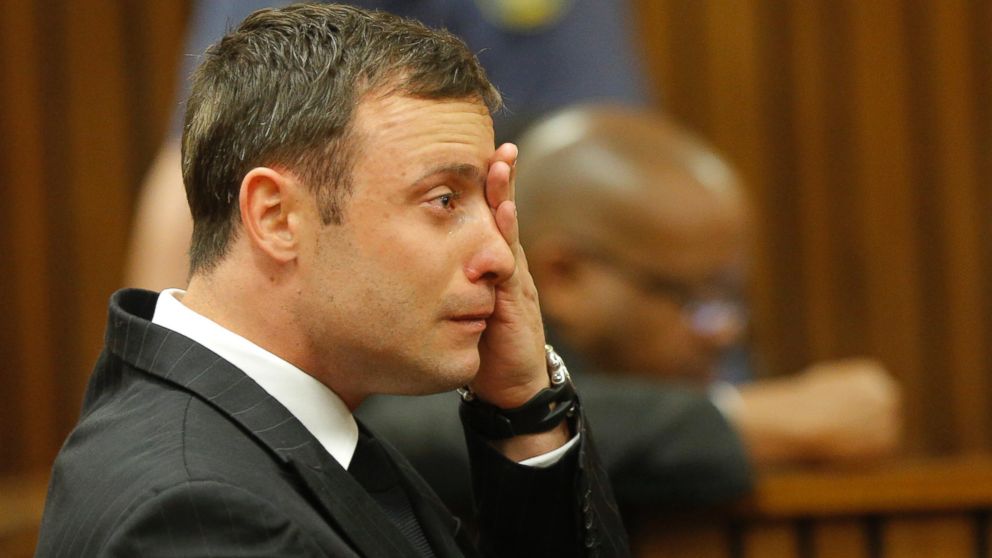 PHOTO: Oscar Pistorius cries in the dock in Pretoria, South Africa, Sept. 11, 2014 as Judge Thokozile Masipa reads notes as she delivers her verdict in Pistorius murder trial.