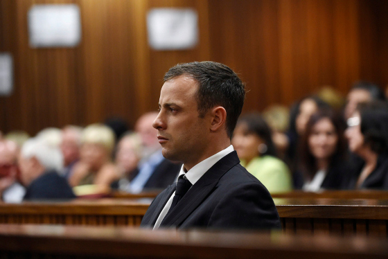 Olympic and Paralympic track star Oscar Pistorius listens to Judge Thokozile Masipa deliver her verdict at the North Gauteng High Court in Pretoria Sept. 11, 2014.