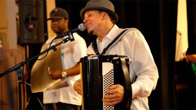 Andre Thierry plays accordion with his zydeco band.