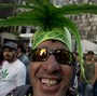 People smoke marijuana, presumably, because it affects their brains, not despite that fact. Above, people in Sao Paulo, Brazil, campaign for the legalization of marijuana.