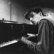 Brilliant Canadian pianist Glenn Gould as a young man, singing as he plays piano at a Steinway warehouse before choosing one for his recording session at Columbia Recording studios.
