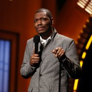 NEW YORK, NY - FEBRUARY 28:  Comedian Michael Che performs during "Late Night with Seth Meyers" on February 28, 2014 in New York City.  (Photo by Peter Kramer/NBC/Getty Images)
