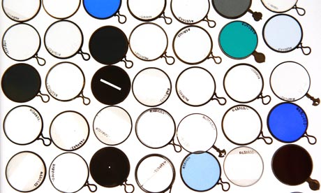 A drawer of antique optical test lenses is displayed at the Science Museum's Object Store in London.
