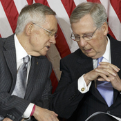 Senate Majority Leader Harry Reid of Nevada (left) talks with Senate Minority Leader Mitch McConnell of Kentucky. The two Senate leaders were on opposite sides of a proposed constitutional amendment to limit fundraising and spending in campaign politics.