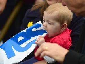 9 September 2014: Six month old Caitlin Tierney holds a yes sign during an event with the First Minister Alex Salmond, where he met with Scots and other European citizens to celebrate European citizenship and Scotland's continued EU membership with a possible Yes vote in Glasgow