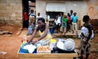 MDG : Ghana economy in trouble : A Ghanaian woman cooks a meal in Accra