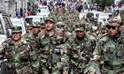 Bolivian low ranking Army officers march in La Paz