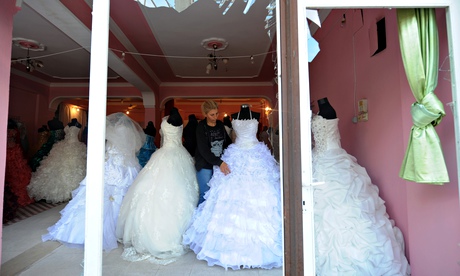 Wedding gowns in a shop window in Reyhanli