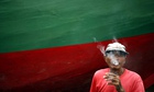 A man smokes a cigarette in Jakarta