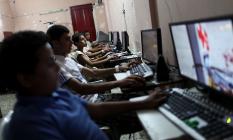 Palestinian boys at an internet bar in Gaza City
