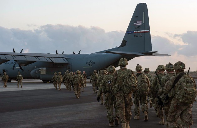 Image of Soldiers entering a plane