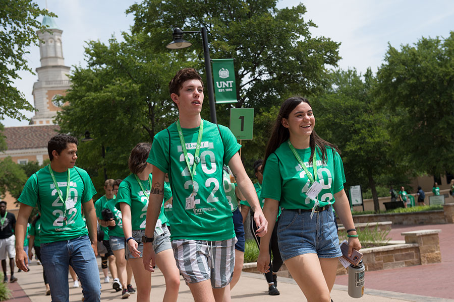 Orientation students walking on campus