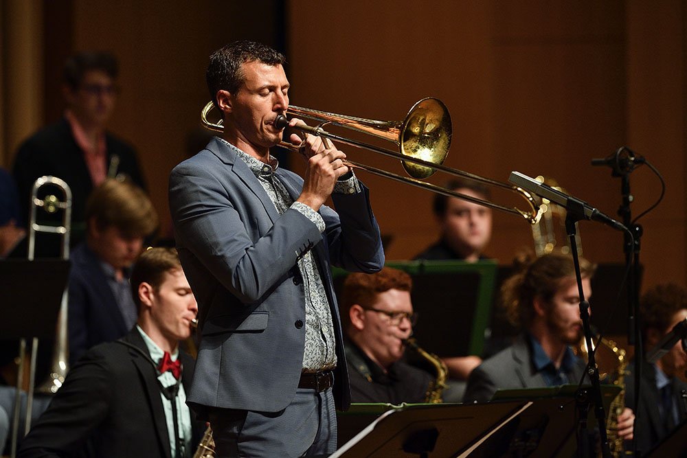 Photo of UNT Assistant Professor of Jazz TromboneNick Finzer playing trombone.