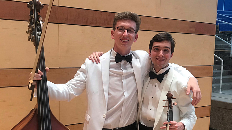 Harrison Dearman and Tomas de la Rosa posting at Aspen Music Festival