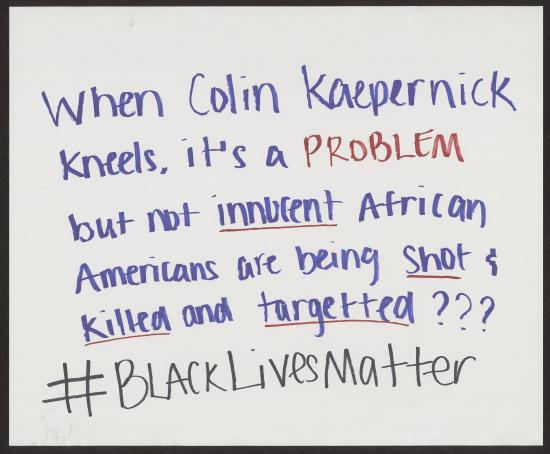 Student protest poster "When Colin Kaepernick kneels..."