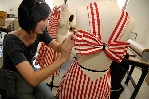 Student works on a dress design.