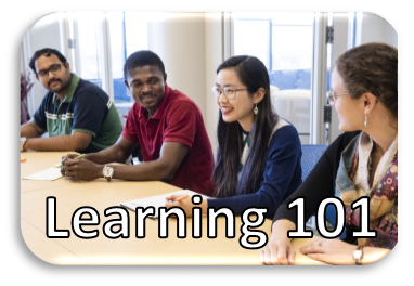 Four people sitting at a table conversing with Learning 101 written on the photo.