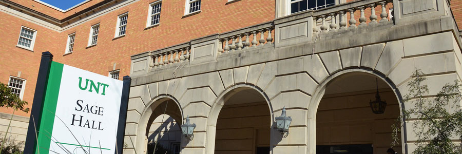 This photo shows the sign for Sage Hall that is on the east side of the building.