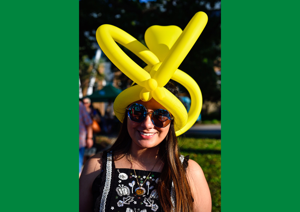 Woman with balloon hat