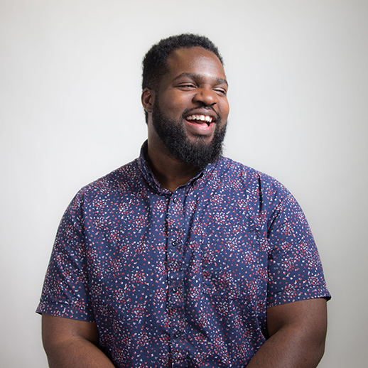 Ernest laughing with white background