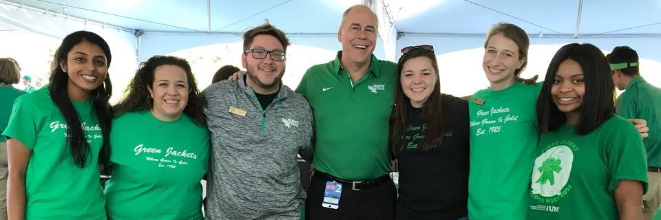 President with green jackets