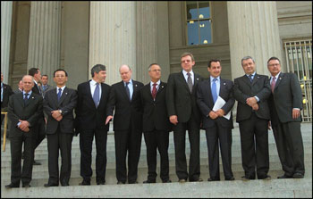 Photo: Secretary John Snow with Finance Ministers During G-7 Meetings