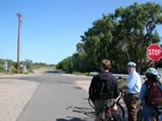 riders on the paseo del bosque bike trail at campbell road