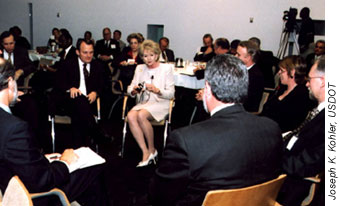 Photo of Mary Peters and industry leaders during conversation circle at summit