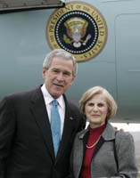 President George W. Bush presented the President’s Volunteer Service Award to Naomi Alamar upon arrival at the airport in Avoca, Pennsylvania, on Thursday, October 19, 2006.  Alamar is a volunteer with SCOLA Volunteers for Literacy.  To thank them for making a difference in the lives of others, President Bush honors a local volunteer, called a USA Freedom Corps Greeter, when he travels throughout the United States.  President Bush has met with more than 500 individuals around the country, like Alamar, since March 2002.