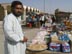 Iraqi merchants sell from carts on the street of Samawah, Iraq. A new market for Samawah, when completed by USAID partner RTI, will provide vendors currently selling in the streets with an organized walled market. 