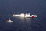 Coast Guard Cutter Staten Island from Fort Macon, N.C., escorts the National Security Cutter Bertholf as it transits through the Chesapeake Bay, Va.