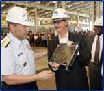 Philip A. Teel,presents the engraved keel plate to Rear Adm. Gary T. Blore.