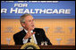 President George W. Bush participates in a panel discussion Tuesday, Aug. 22, 2006, at the Minneapolis Marriott Southwest in Minnetonka, Minn., to offer perspectives on efforts to enhance health care transparency and move towards a value-based health care competition. White House photo by Paul Morse