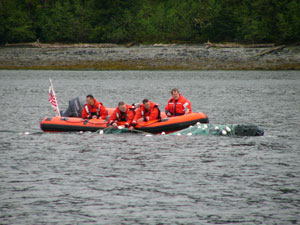 Stranding network members with the assistance of the US Coast Guard free  an entangled humpback whale