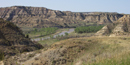 The colorful Little Missouri Badlands provides the scenic backdrop to Theodore Roosevelt National Park.