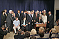 President Bush signing into law the MINER act, as lawmakers and sole Sago Mine survivor Randy McCloy and his wife, Anna, look on.