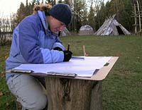 (NPS photo) Archeologist documents fieldwork at Grand Portage National Monument