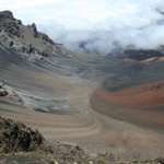 The sweeping view from the summit takes in this colorful field of cinder.