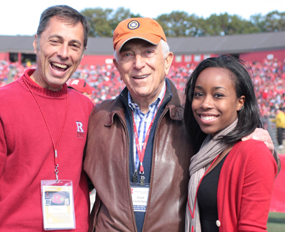 Senator Lautenberg joins Rutgers tennis stand-out Katrina Elder-Bush and women’s tennis coach Ben Bucca at the Rutgers-Connecticut football game in Piscataway. Elder-Bush was honored at halftime as the top female student-athlete at Rutgers during the 2007-2008 academic year. Also honored were former football players Ray Rice and Brandon Renkart, as well as women’s Olympic soccer gold medalist Carli Lloyd. (October 18, 2008; photo by Joe Campbell)