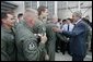 President George W. Bush greets Air Force reservists from Grissom Air Force Base, 434th Air Refueling Wing, at Wright-Patterson Air Force Base Monday, Sept. 27, 2004.  White House photo by Eric Draper