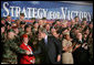 President George W. Bush greets the audience after delivering remarks on the war on terror, Friday, Nov. 11, 2005 at the Tobyhanna Army Depot in Tobyhanna, Pa. White House photo by Eric Draper